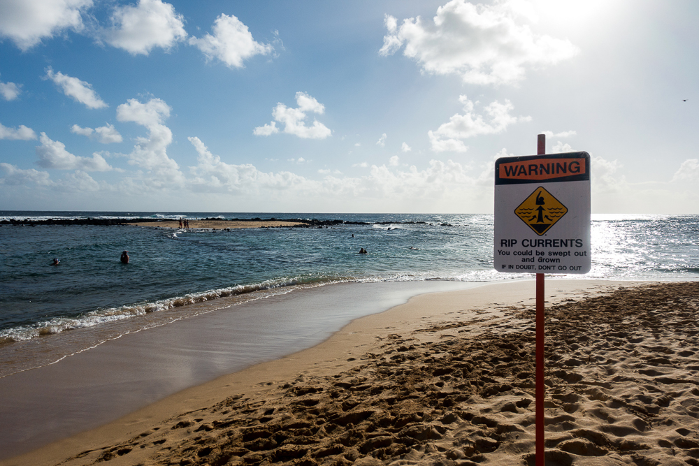 hawaii poipu beach warning sign