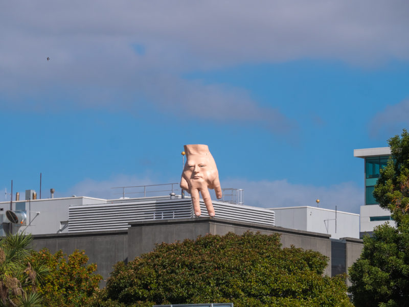 new zealand christchurch hand on roof